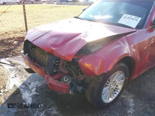 2009 Chrysler 300 LX with VIN 2C3KA43D69H565894, listed as a IAAI auction lot 41283079 with 233,098 mi miles. Bid and sale history available at carsss.com. Image 6.