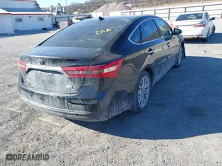 2016 Toyota Avalon Hybrid XLE Premium with VIN 4T1BD1EB2GU049888, listed as a IAAI auction lot 41421165 with 56,426 mi miles. Bid and sale history available at carsss.com. Image 4.