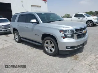 2016 Chevrolet Tahoe LT z VIN 1GNSCBKC5GR345900, wystawiony jako IAAI lot #41937191 z przebiegiem 141 252 mil mil oraz . Historia ofert i sprzedaży dostępna na DreamBid. Obrazek 1.