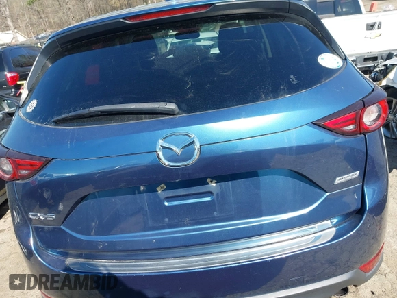 2017 Mazda CX-5 Grand Touring with VIN JM3KFADL8H0105518, listed as a IAAI auction lot 41876779 with 82,540 mi miles. Bid and sale history available at carsss.com. Image 16.