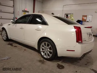 2009 Cadillac CTS AWD w/1SB with VIN 1G6DT57VX90110769, listed as a IAAI auction lot 41696744 with 164,127 mi miles. Bid and sale history available at carsss.com. Image 3.