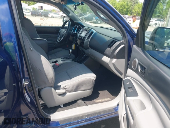 2015 Toyota Tacoma with VIN 3TMLU4EN1FM187705, listed as a IAAI auction lot 42119222 with 115,471 mi miles and . Bid and sale history available at DreamBid. Image 5.