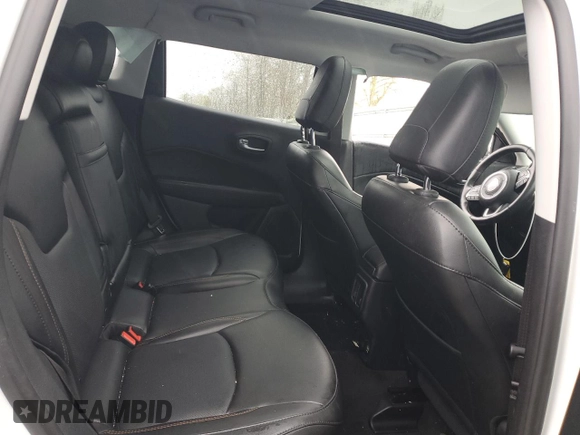 2019 Jeep Compass Limited z VIN 3C4NJDCB0KT599043, wystawiony jako Copart lot #56011245 z przebiegiem Nie podano mil oraz Szkoda całkowita • Salvage title. Historia ofert i sprzedaży dostępna na DreamBid. Obrazek 11.