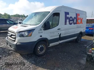 2020 Ford Transit Cargo z VIN 1FTBR1C87LKA51039, wystawiony jako IAAI lot #42212523 z przebiegiem 183 020 mil mil oraz . Historia ofert i sprzedaży dostępna na DreamBid. Obrazek 17.