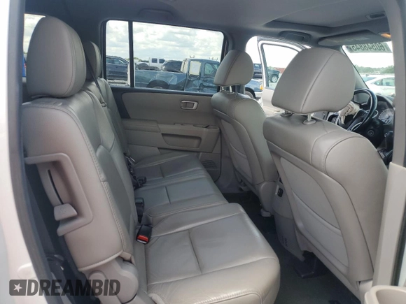 2015 Honda Pilot EX-L с VIN 5FNYF3H7XFB031822, выставлен на аукционе Copart как лот 60548845 с пробегом 144 353 миль миль и На запчасти • Non repairable. История ставок и продаж доступна на DreamBid. Изображение 11.