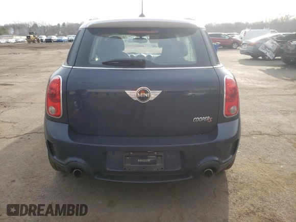 2012 MINI Countryman S with VIN WMWZC5C55CWL64092, listed as a Copart auction lot 50703855 with 69,785 mi miles and Salvage Title. Bid and sale history available at DreamBid. Image 6.