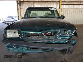2001 Mazda B-Series Truck DS z VIN 4F4YR12U31TM11995, wystawiony jako Copart lot #74604534 z przebiegiem 140 015 mil mil oraz Czysty tytuł • Clean title. Historia ofert i sprzedaży dostępna na DreamBid. Obrazek 5.