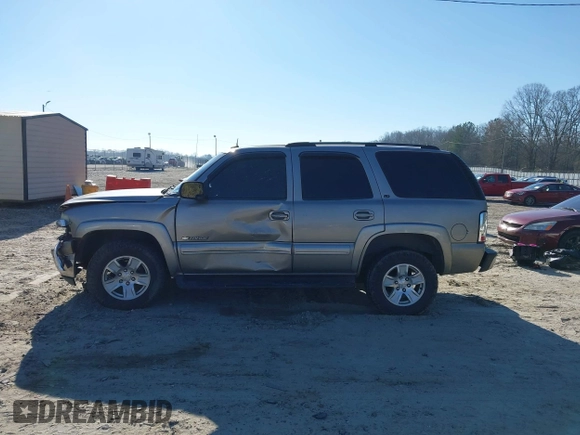 2003 Chevrolet Tahoe LS with VIN 1GNEK13Z03J294201, listed as a IAAI auction lot 41656836 with 302,922 mi miles. Bid and sale history available at carsss.com. Image 14.