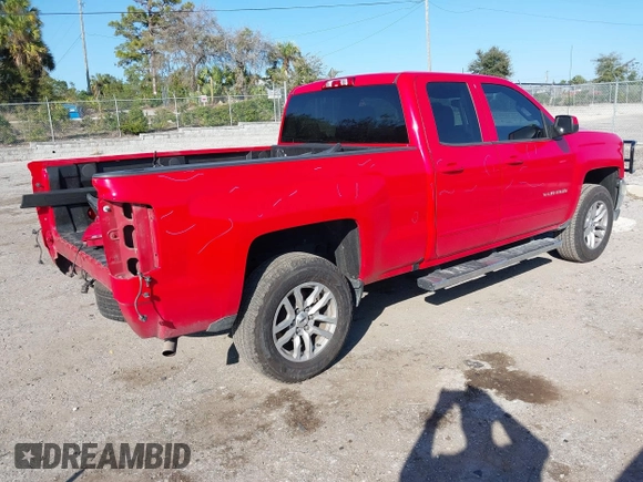 2018 Chevrolet Silverado 1500 LT with VIN 1GCRCREC1JZ170659, listed as a IAAI auction lot 41522588 with 129,412 mi miles and . Bid and sale history available at DreamBid. Image 4.
