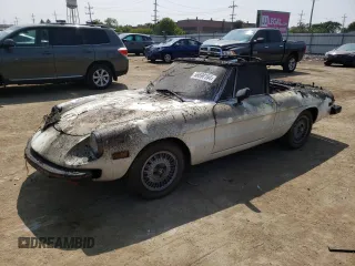 1978 Alfa Romeo Spider z VIN 115410002428, wystawiony jako Copart lot #56698104 z przebiegiem Nie podano mil oraz Szkody całkowita. Historia ofert i sprzedaży dostępna na DreamBid. Obrazek 1.