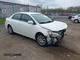 2013 Toyota Corolla L with VIN 2T1BU4EE7DC046672, listed as a IAAI auction lot 42142984 with 144,762 mi miles. Bid and sale history available at carsss.com. Image 1.
