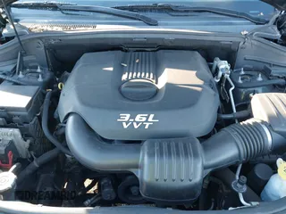 2014 Jeep Grand Cherokee Summit with VIN 1C4RJEJG1EC130727, listed as a IAAI auction lot 41269066 with 205,914 mi miles and . Bid and sale history available at DreamBid. Image 10.