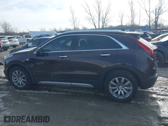2020 Cadillac XT4 AWD Premium Luxury z VIN 1GYFZDR4XLF085471, wystawiony jako IAAI lot #41528080 z przebiegiem 58 136 mil mil oraz . Historia ofert i sprzedaży dostępna na DreamBid. Obrazek 14.