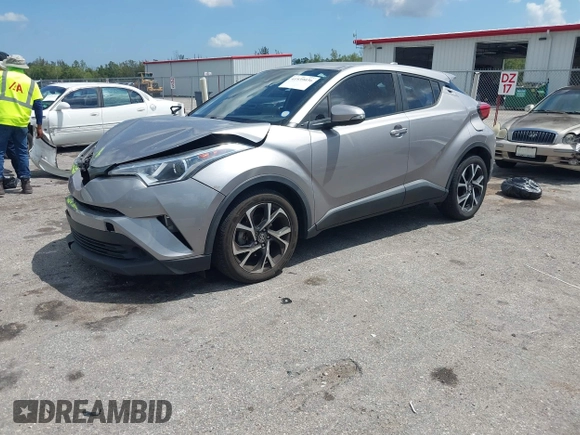 2019 Toyota C-HR XLE with VIN NMTKHMBX8KR093044, listed as a IAAI auction lot 41939036 with 60,130 mi miles. Bid and sale history available at carsss.com. Image 2.