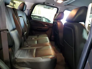 2013 Chevrolet Tahoe LT z VIN 1GNSKBE08DR264454, wystawiony jako Copart lot #60296205 z przebiegiem 135 688 mil mil oraz Szkoda całkowita • Salvage title. Historia ofert i sprzedaży dostępna na DreamBid. Obrazek 11.