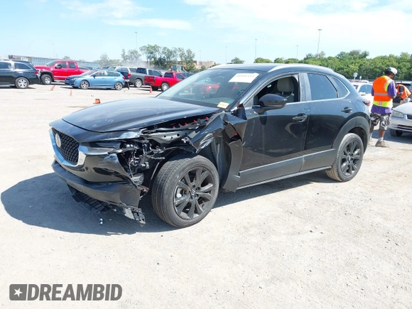 2022 Mazda CX-30 2.5 Turbo with VIN 3MVDMBAY4NM452705, listed as a IAAI auction lot 40101452 with 18,873 mi miles and . Bid and sale history available at DreamBid. Image 17.