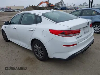 2019 Kia Optima LX with VIN 5XXGT4L35KG324274, listed as a IAAI auction lot 42111177 with 126,494 mi miles. Bid and sale history available at carsss.com. Image 3.
