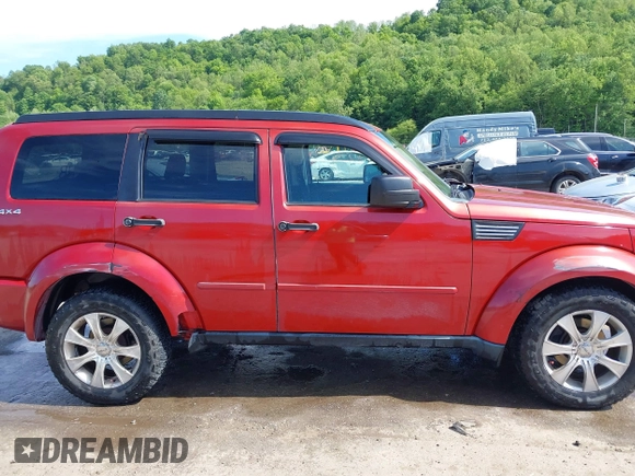 2010 Dodge Nitro Heat z VIN 1D4PU4GK5AW174777, wystawiony jako IAAI lot #42290362 z przebiegiem 165 537 mil mil oraz . Historia ofert i sprzedaży dostępna na DreamBid. Obrazek 13.