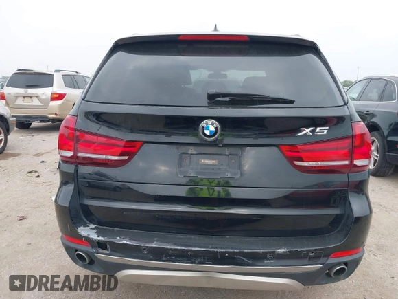2014 BMW X5 xDrive35d with VIN 5UXKS4C56E0J93861, listed as a IAAI auction lot 41906775 with 149,263 mi miles. Bid and sale history available at carsss.com. Image 16.