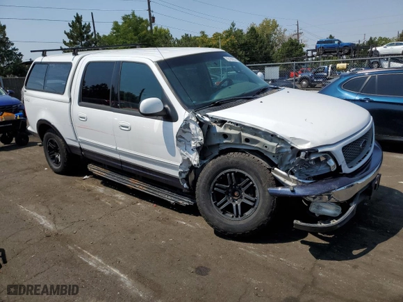 2001 Ford F-150 SuperCrew XLT with VIN 1FTRW08L31KF24186, listed as a Copart auction lot 65188904 with 0 mi miles and Salvage Title. Bid and sale history available at carsss.com. Image 4.
