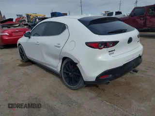 2021 Mazda 3 Premium with VIN JM1BPAML0M1302385, listed as a IAAI auction lot 41397521 with 55,907 mi miles and . Bid and sale history available at DreamBid. Image 3.