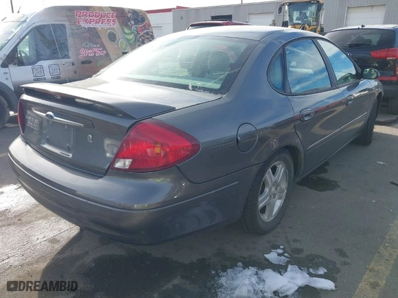 2002 Ford Taurus SEL with VIN 1FAFP56S52A207465, listed as a IAAI auction lot 41218559 with 170,003 mi miles. Bid and sale history available at carsss.com. Image 4.