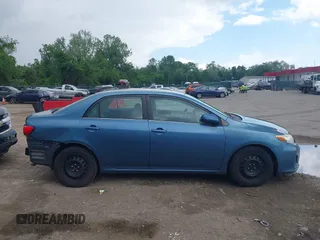 2013 Toyota Corolla L with VIN 5YFBU4EE9DP210262, listed as a IAAI auction lot 42209025 with 204,463 mi miles and . Bid and sale history available at DreamBid. Image 14.