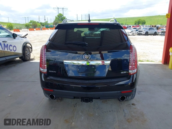 2012 Cadillac SRX Premium Collection z VIN 3GYFNCE36CS615725, wystawiony jako IAAI lot #42738584 z przebiegiem 156 625 mil mil oraz . Historia ofert i sprzedaży dostępna na DreamBid. Obrazek 16.