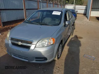 2009 Chevrolet Aveo 1LT z VIN KL1TD56E49B372791, wystawiony jako IAAI lot #41890124 z przebiegiem 118 648 mil mil oraz . Historia ofert i sprzedaży dostępna na DreamBid. Obrazek 17.