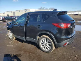 2013 Mazda CX-5 Grand Touring with VIN JM3KE4DE5D0168253, listed as a Copart auction lot 52112935 with 143,375 mi miles and Salvage Title. Bid and sale history available at carsss.com. Image 2.