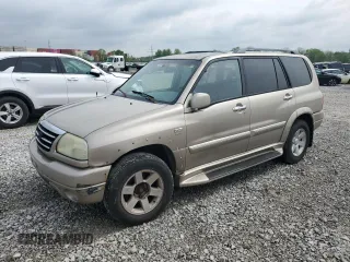2002 Suzuki XL7 Standard z VIN JS3TX92V224102077, wystawiony jako Copart lot #54737285 z przebiegiem 334 749 mil mil oraz Nie do naprawy • Non repairable. Historia ofert i sprzedaży dostępna na DreamBid. Obrazek 1.