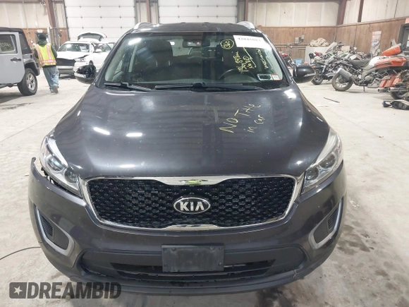 2016 Kia Sorento LX with VIN 5XYPGDA39GG170291, listed as a IAAI auction lot 42045883 with 136,848 mi miles. Bid and sale history available at carsss.com. Image 12.