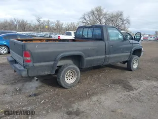 1995 Dodge Ram 1500 with VIN 1B7HF16Y1SS150002, listed as a IAAI auction lot 41874613 with 305,502 mi miles. Bid and sale history available at carsss.com. Image 4.