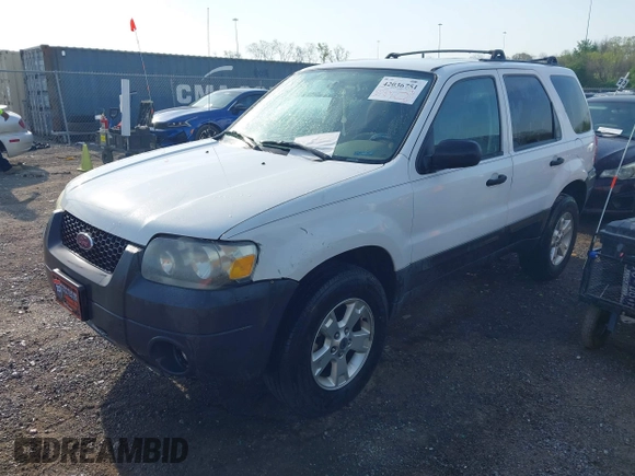 2005 Ford Escape XLT with VIN 1FMYU93145KD85599, listed as a IAAI auction lot 42036751 with 221,039 mi miles and . Bid and sale history available at DreamBid. Image 2.