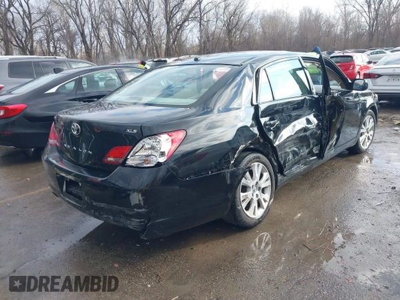 2010 Toyota Avalon XL with VIN 4T1BK3DBXAU357773, listed as a IAAI auction lot 41228045 with 127,403 mi miles and . Bid and sale history available at carsss.com. Image 4.