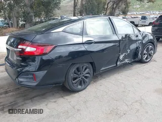 2018 Honda Clarity Plug-In Hybrid with VIN JHMZC5F10JC014054, listed as a IAAI auction lot 41932195 with 100,643 mi miles. Bid and sale history available at carsss.com. Image 4.