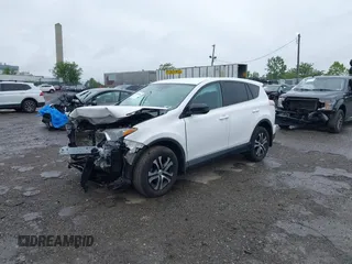 2018 Toyota RAV4 LE with VIN 2T3BFREV7JW851015, listed as a IAAI auction lot 42354042 with 94,603 mi miles and . Bid and sale history available at DreamBid. Image 17.