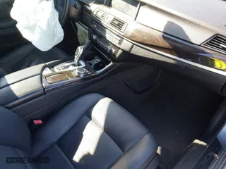 2014 BMW 5 Series 528i with VIN WBA5A5C58ED506079, listed as a IAAI auction lot 41236765 with 157,283 mi miles. Bid and sale history available at carsss.com. Image 5.