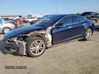 2014 Tesla Model S 60 с VIN 5YJSA1H16EFP50018, выставлен на аукционе Copart как лот 64372605 с пробегом 165 910 миль миль и Списание • Salvage title. История ставок и продаж доступна на DreamBid. Изображение 1.