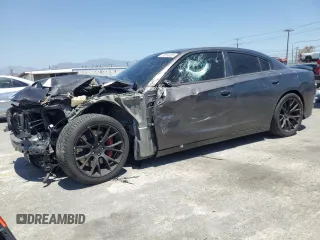 2016 Dodge Charger R/T with VIN 2C3CDXCT2GH258899, listed as a Copart auction lot 57914935 with 28,643 mi miles and Salvage title. Bid and sale history available at DreamBid. Image 1.