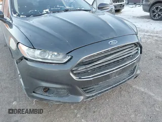 2015 Ford Fusion SE Hybrid with VIN 3FA6P0LU1FR219908, listed as a IAAI auction lot 41272688 with 310,452 mi miles. Bid and sale history available at carsss.com. Image 12.