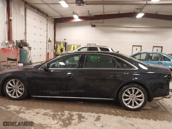 2013 Audi A8 L 3.0L with VIN WAURGAFD4DN002603, listed as a IAAI auction lot 41474881 with 117,220 mi miles. Bid and sale history available at carsss.com. Image 14.