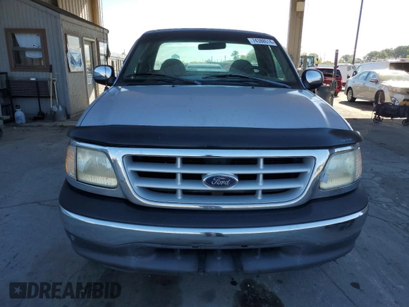 1999 Ford F-150 XL with VIN 1FTRF17L7XNA73732, listed as a Copart auction lot 74388514 with Not provided miles and Clean title. Bid and sale history available at DreamBid. Image 5.
