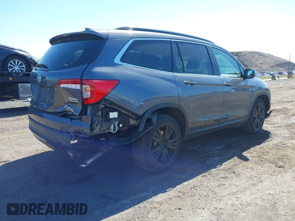 2021 Honda Pilot Special Edition z VIN 5FNYF6H27MB043638, wystawiony jako IAAI lot #42127878 z przebiegiem 50 401 mil mil oraz . Historia ofert i sprzedaży dostępna na DreamBid. Obrazek 4.