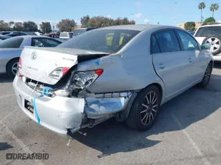 2005 Toyota Avalon XL with VIN 4T1BK36B15U035218, listed as a IAAI auction lot 41901091 with 173,503 mi miles. Bid and sale history available at carsss.com. Image 4.