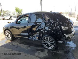 2018 Audi Q3 Premium with VIN WA1BCCFS9JR033287, listed as a Copart auction lot 58251185 with 157,839 mi miles and Salvage title. Bid and sale history available at DreamBid. Image 2.
