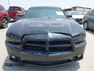 2014 Dodge Charger RT z VIN 2C3CDXCT4EH337763, wystawiony jako IAAI lot #42281217 z przebiegiem 121 653 mil mil oraz . Historia ofert i sprzedaży dostępna na DreamBid. Obrazek 6.