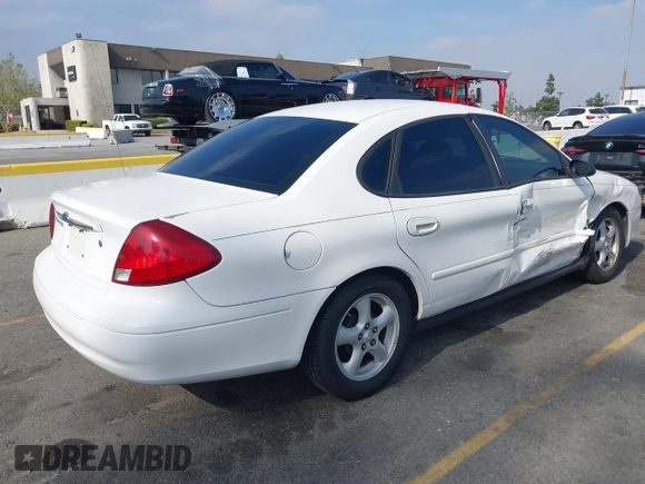 2003 Ford Taurus SES Standard with VIN 1FAFP55293G176494, listed as a IAAI auction lot 42040985 with 95,550 mi miles. Bid and sale history available at carsss.com. Image 4.