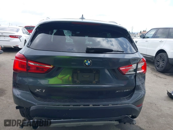2021 BMW X1 xDrive28i with VIN WBXJG9C03M3M80011, listed as a IAAI auction lot 42137781 with 132,969 mi miles. Bid and sale history available at carsss.com. Image 16.