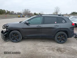 2016 Jeep Cherokee 75th Anniversary with VIN 1C4PJMCB0GW156076, listed as a IAAI auction lot 41946760 with 105,571 mi miles. Bid and sale history available at carsss.com. Image 15.